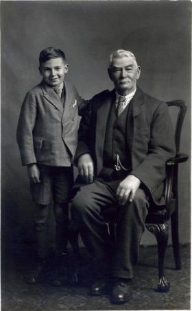 Portrait of Ronald Gear as a boy with his grandfather