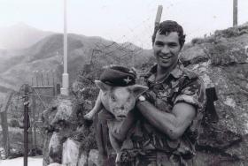 Pte Wells with 'Billy', B Coy 1 PARA mascot, in mountain border region, Hong Kong, 1980
