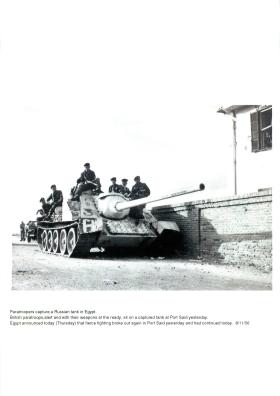 Paratroopers capture a Russian SU-100 tank in Port Said.