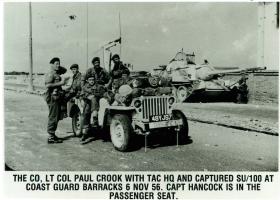 Lieutenant Paul Crook (left) with Tactical HQ at Coast Guard Barracks, November 6, 1956. 