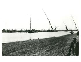 Egyptians evacuate Port Said from the Falucca harbour. 