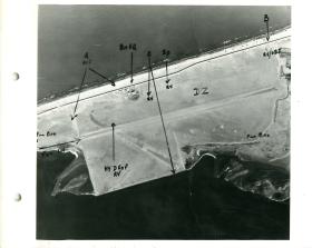 Aerial shot of El Gamil Airfield annotated to show drop zone, rendezvous points, and direction of fly in. 