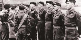 Montgomery talks to Sgt Philip McDonnell, with other NCOs of the 3rd Parachute Battalion.