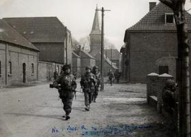 Troops of 1 Parachute Pl, 716 Light Comp Coy RASC in the streets of Hammilkeln, March 1945
