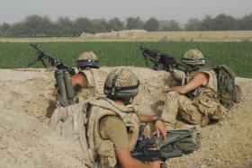 Soldiers of C Coy, 2 PARA provide fire support during an engagement with the Taliban, FOB Gibraltar, Afghanistan, July 2008.