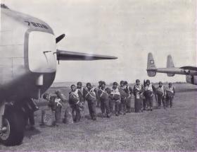 A stick from 45th Parachute Brigade about to emplane a C119 Boxcar, Ex Spearhead 1952