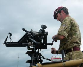 L/Cpl Allen demonstrating the .50 cal machine gun to members of the public IWM Duxford, 17 June 2012.