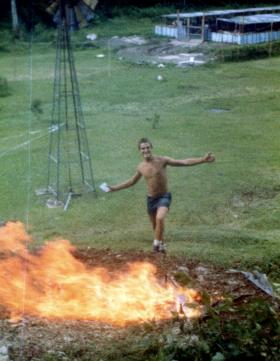 'Bob' Hilton burning out the trenches at Salamanca Camp, Belize, 1983.