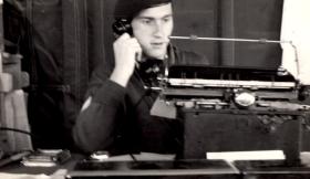 Sgt Paddy Bruen on the phone in the office