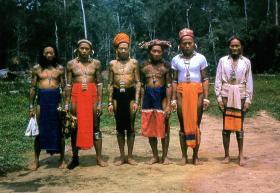 Tribesmen in ceremonial dress, Borneo, 1965.