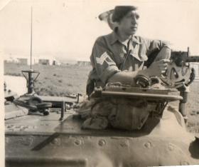 Sgt Denis Chapman looks out from a Staghound at the Bridge of Acorn, Megiddo, Palestine, 1947.