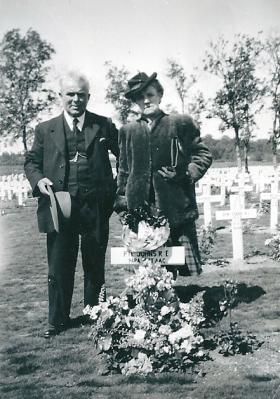 William and Daisy Johns at their son Robert Johns' grave