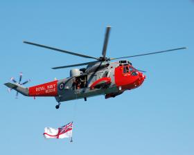 A fly past by a helicopter from RNAS Culdrose at Trebah Military Day 2009