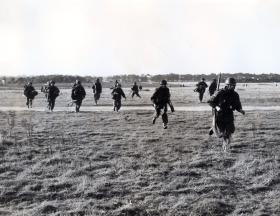 Men of 16th Airborne Division moving off DZ, Ex King's Joker, 1953