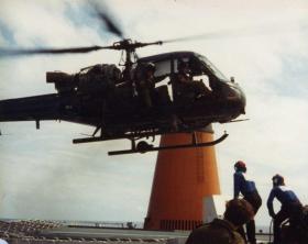 A Westland Scout helicopter lands on the MV Norland, 1982