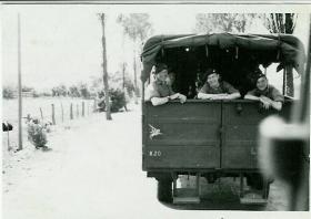 Members of 5th Para Bn look out from a truck, Germany 1948