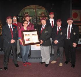Grimsby PRA present a framed copy of the presentation of colours to the museum, 2010.