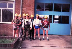 Roy Taylor in group photo prior to 120 mile charity walk in breathing apparatus, 1987