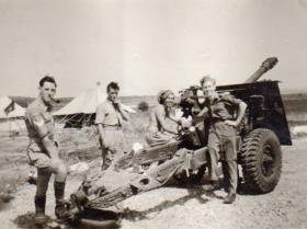 Gunner Hare and friends with 25 pounder gun
