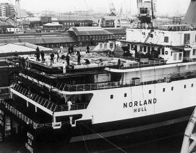 MV Norland being fitted with helipad prior to heading south on Operation Corporate, Hull, 1982.