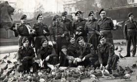 Members of The Parachute Regiment having received medals from King George VI, 1947.