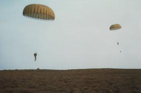 Two Paratroopers arrive at the DZ, Isle of Man, April 1984