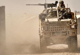 Soldiers from 9 Parachute Squadron, 23 Engineer Regiment, patrolling in a Jackal vehicle, Afghanistan, 2010.
