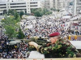 Sgt Paul Tonks protecting Madeleine Albright (US Secretary of State) Kosovo, 1999.