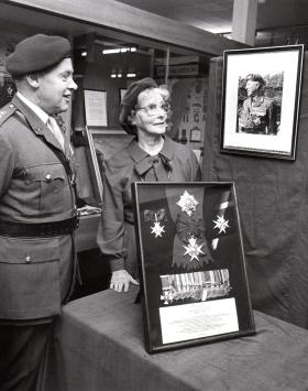 Presentation of Sir Gerald Lathbury's medals to the Parachute museum by Lady Lathbury, c.1983