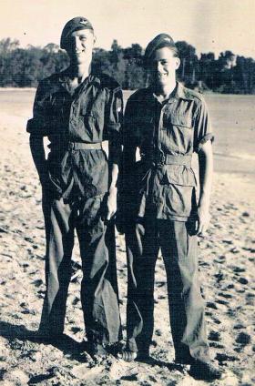 Two members of 7th (LI) Para Bn on a beach in the Far East, c1946.