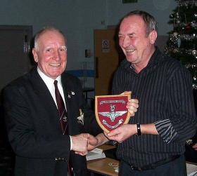 Peter Morrison receiving a plaque from former QM of 15 PARA Frank Cameron, date unknown.