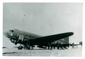 Men from 1st Parachute Battalion emplane a Dakota aircraft for a drop at Souk-El-Arba. 