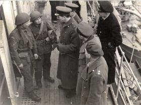Gp Capt Sir Nigel Norman talks with Flt Sgt Cox after the operation, Bruneval, 1942.