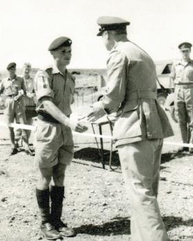 Cpl Macefield receives his cross country award from Gen Stockwell, Cyprus, c1960.