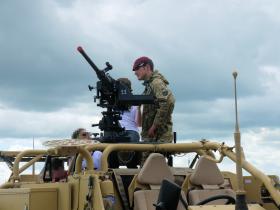 Pte Miles Davis exhibiting the Coyote to members of the public at IWM Duxford 17 June 2012