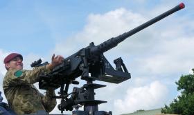 Cpl Logan 3 PARA demonstrating a .50 cal machine gun to members of the public at IWM Duxford, 17 June 2012.