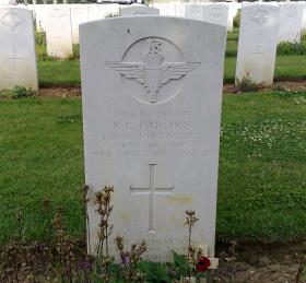 Headstone of Pte Robert G Parsons, Ranville War Cemetery, date unknown.