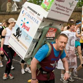 Pete Digby running the London Marathon carrying a washing machine, raising funds for the Afghan Trust, April 2012.