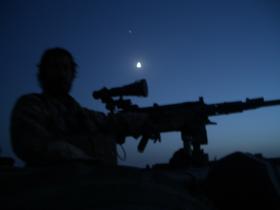 .50 cal gunner at night during Herrick XIII, Afghanistan, c2011.