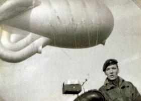 Private C Dennison with balloon in the background, date unknown.