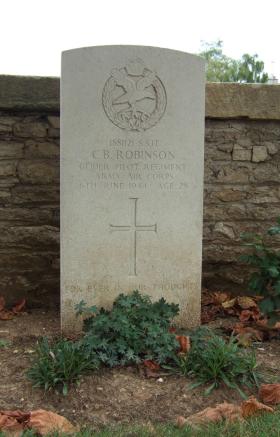 Headstone of SSgt Robinson, Ranville Churchyard, August 2010.