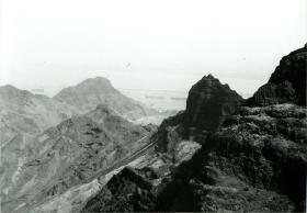 Rocky terrain overlooking oil refinery, Aden, c.1967