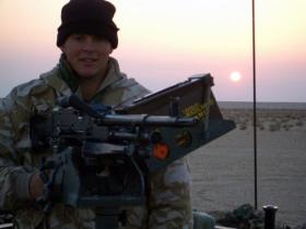 Pte ‘Ross’ Phillipson manning a GPMG,  Iraq, 2005.