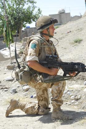 3 PARA soldier patrolling with SA80A2 Under slung Grenade Launcher, Kandahar, Afghanistan, June 2008