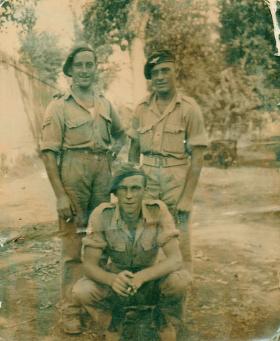 Group photograph of Sgt David R Wilkins (crouched down)