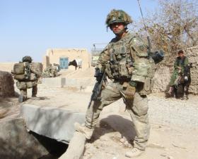 Sgt Magreehan pauses on foot patrol in Afghanistan, 2010