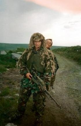 Pte 'Ross' Phillipson in a Ghillie Suit during sniper training, Pirbright, date unknown.