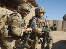 The soldier on the left has a painted Mk 7 helmet in lieu of a cover, 2 PARA, Afghanistan, 2010.