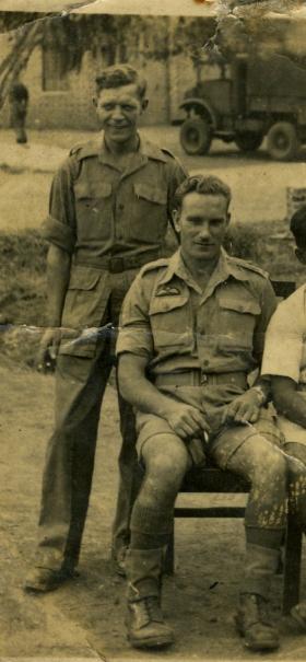 Sonny Royan seated with colleagues in the Far East, 1945