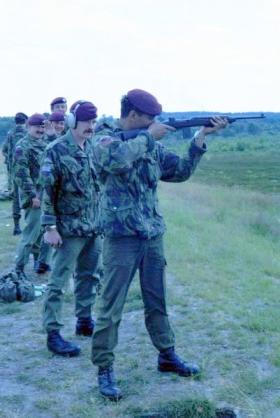 Steve Lewis with M1 carbine, with 'Skiddy' and Andy Mason in the background, 1 PARA, date unknown.